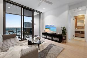 Posezení v ubytování Luxurious 2BR Apt w River View