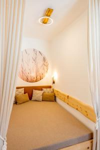 Ένα ή περισσότερα κρεβάτια σε δωμάτιο στο Winzerhof Lentsch +29 φωτογραφίες