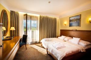Posteľ alebo postele v izbe v ubytovaní Hotel International