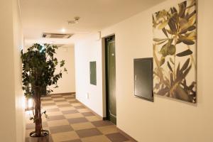 TV a/nebo společenská místnost v ubytování Hotel Honjo