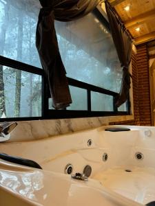 Fotografie z fotogalerie ubytování Cabaña Zacatlan Jacuzzi v destinaci Tomatlán