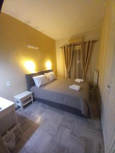 Кровать или кровати в номере Hermes Hotel