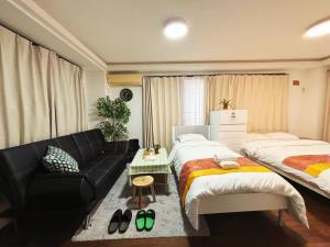 Letto o letti in una camera di Jl千住別荘