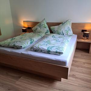 Posteľ alebo postele v izbe v ubytovaní Ferienwohnung Schatzhof