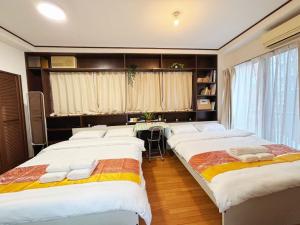 Letto o letti in una camera di Jl千住別荘