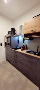 Η κουζίνα ή μικρή κουζίνα στο Apartment Bali - live better with AH Living