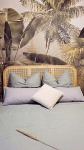 Ένα ή περισσότερα κρεβάτια σε δωμάτιο στο Apartment Bali - live better with AH Living