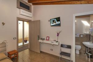 TV a/nebo společenská místnost v ubytování Colorado Home