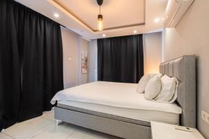 Ένα ή περισσότερα κρεβάτια σε δωμάτιο στο Kleopatra City II