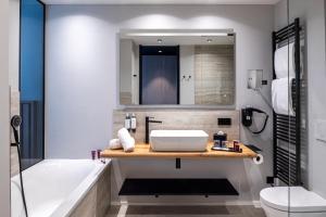 Kúpeľňa v ubytovaní Anatura Hotel Luxembourg