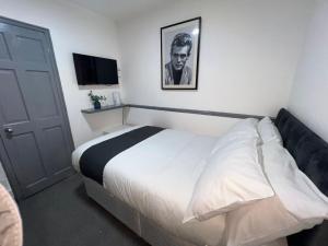 OYO Greenway Stays客房内的一张或多张床位