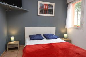 Postel nebo postele na pokoji v ubytování Grand studio 3 50m de la plage