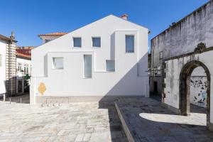 ヴィアナ・ド・カステロにあるMexia Galvão city centerの壁面白い建物