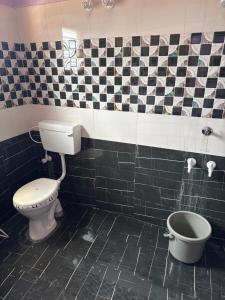 Koupelna v ubytování Aura Rooms