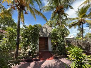 Zahrada ubytování Tikipalmbeachhotel