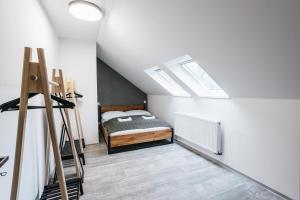 Postel nebo postele na pokoji v ubytování Apartmány Petra Voka