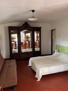 Postel nebo postele na pokoji v ubytování T1 charme Landais à la ferme