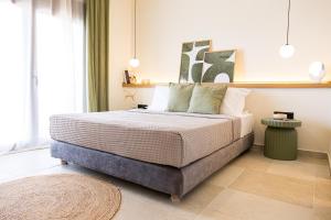 a bedroom with a large bed in a room at Barn Villa in Nikiti +95 photos