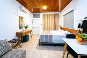 Letto o letti in una camera di Helios Bay Hotel and Suites