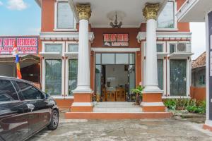 Fotografie z fotogalerie ubytování OYO 94067 The Roy Suite Guest House v destinaci Bandar Lampung