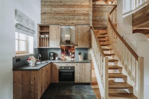 Küche/Küchenzeile in der Unterkunft Alpzitt-Chalets
