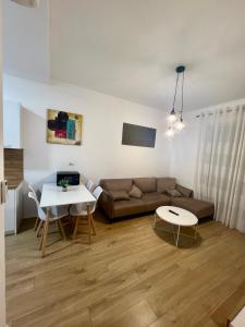 Televisyen dan/atau pusat hiburan di Urban Oasis Apartment