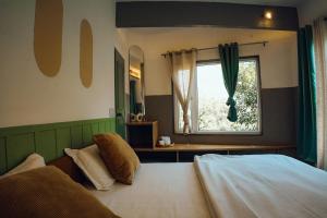 Art Bliss Hostel客房内的一张或多张床位