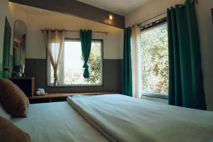 Art Bliss Hostel客房内的一张或多张床位