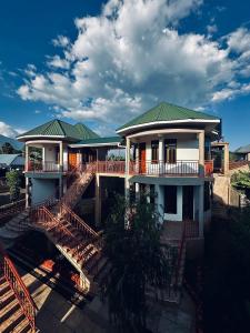 an aerial view of a house with a deck at Wademac Arusha Inn Hotel in Arusha