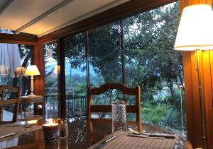 Um jardim em Swiss Eviniz Hotel