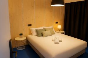 Postel nebo postele na pokoji v ubytování Koala Hostel Mercado