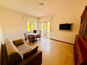 Et tv og/eller underholdning på Oltremare Central Apartment