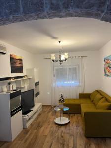 Kuchyň nebo kuchyňský kout v ubytování Apartmani Karla