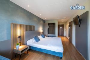 Postel nebo postele na pokoji v ubytování Hotel Pineta Campi