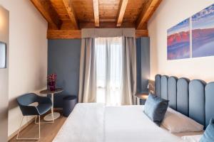 Postel nebo postele na pokoji v ubytování Hotel Pineta Campi + 37 fotografií