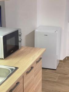 Kuchyň nebo kuchyňský kout v ubytování U Tonyho - Homestay Strakonice 1-kk + 5 fotografií