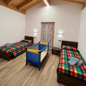Postel nebo postele na pokoji v ubytování Ciasa Erica - Val di Non
