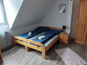 Postel nebo postele na pokoji v ubytování Penzión Kupfer