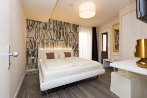 Llit o llits en una habitació de Pace 1954 Hotel