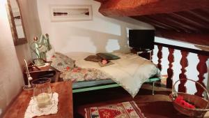 Postel nebo postele na pokoji v ubytování La Dimora del 1700