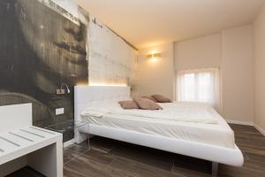 Llit o llits en una habitació de Pace 1954 Hotel