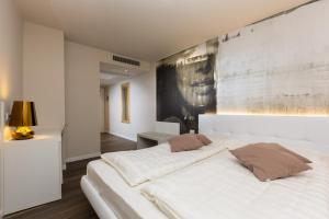 Llit o llits en una habitació de Pace 1954 Hotel