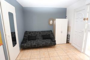 Posezení v ubytování Grand studio 5 pour 2 a 4 p + 2 fotografie