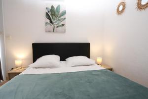 Postel nebo postele na pokoji v ubytování Grand studio 5 pour 2 a 4 p