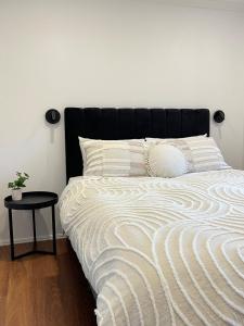 Ένα ή περισσότερα κρεβάτια σε δωμάτιο στο Serene Haven in Sanctuary Point