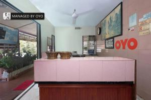 Μια τηλεόραση ή/και κέντρο ψυχαγωγίας στο Hotel O Lumut Villa Inn
