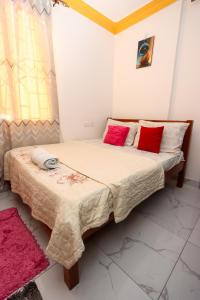 Postel nebo postele na pokoji v ubytování Denella studio apartment + 2 fotografie