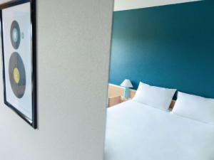 Postel nebo postele na pokoji v ubytování Hotel ibis Narbonne