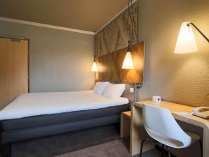 Postel nebo postele na pokoji v ubytování ibis Montauban