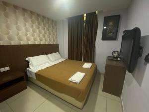 Postel nebo postele na pokoji v ubytování Hotel O Hotel Hamilas